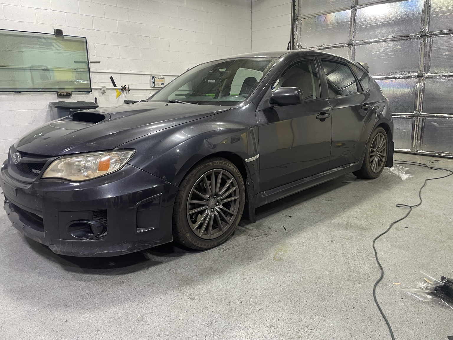 Ceramic window tint installation at East Valley AutoWerks — before