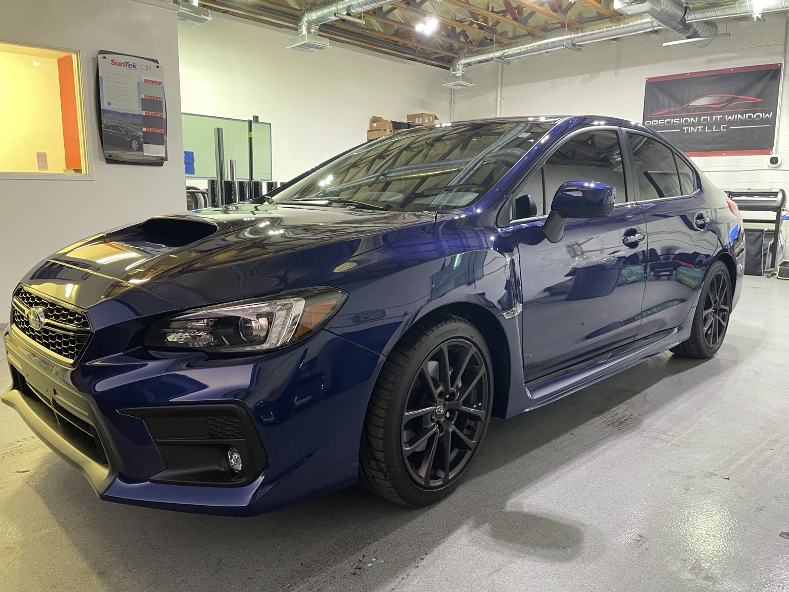 Finished blue Subaru WRX after paint protection film installation