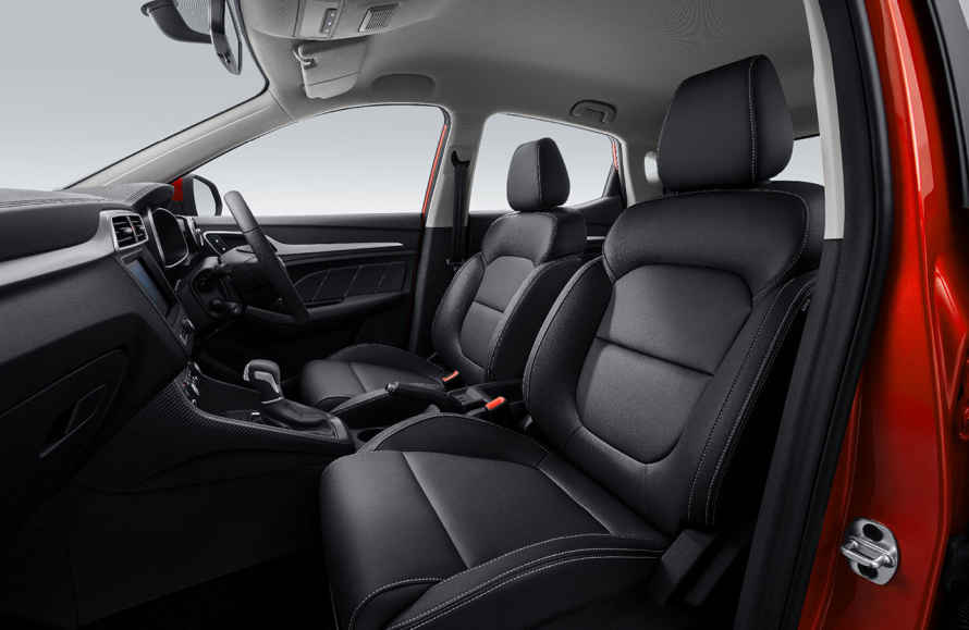 Spacious rear cargo area of the MG ZS with folded rear seats to show extended boot capacity.