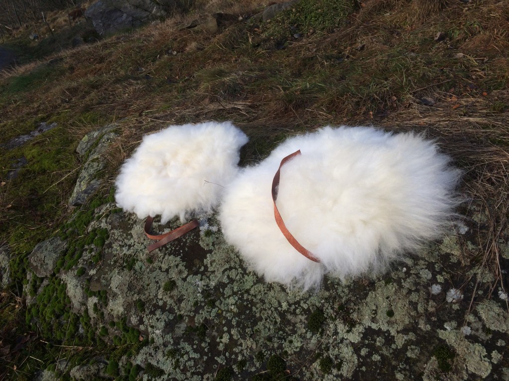 Flotte sitteunderlag av lam