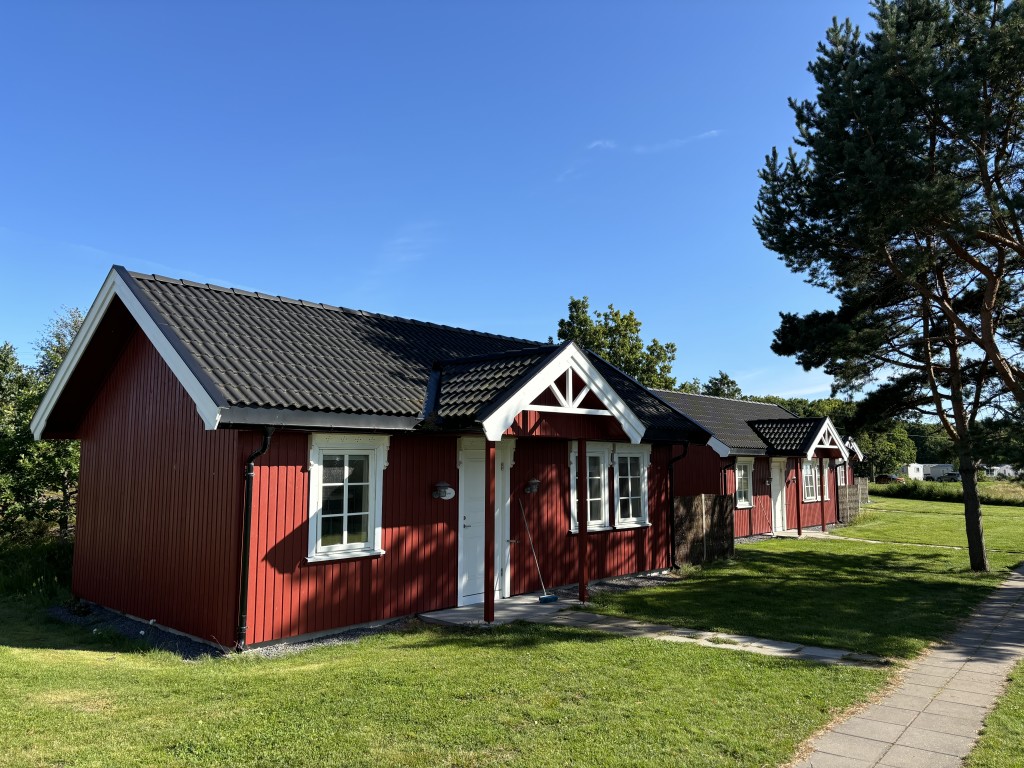 3 av småhusene sett på rekke