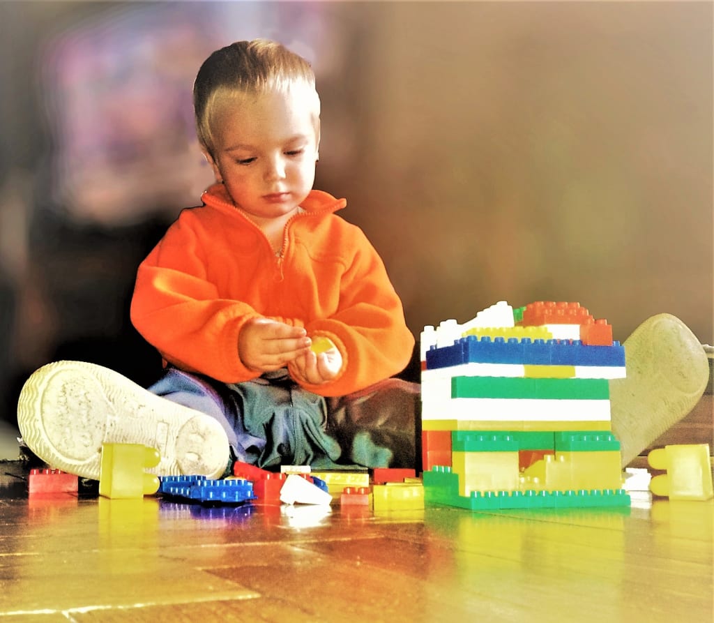 constructive play as one of types of children's play: children's play with lego types of children's play