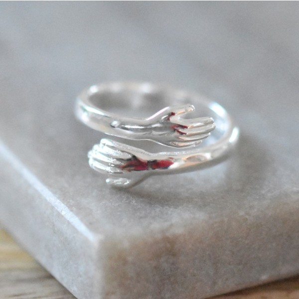 The hug ring top