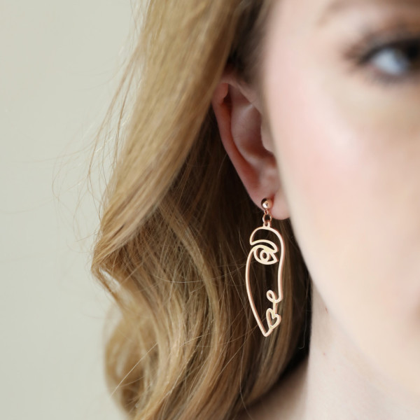 Half face earrings deals