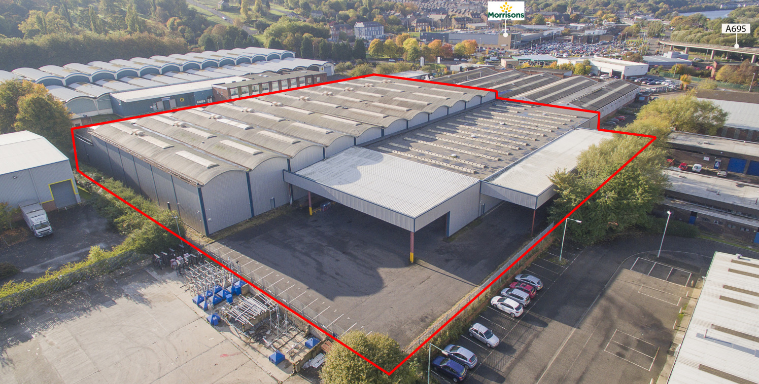 Extensive refurbished warehouse/industrial building. Eaves height up to 8.4m. 5 level access loading doors. Dock level loading. Two storey offices. Secure service yard.