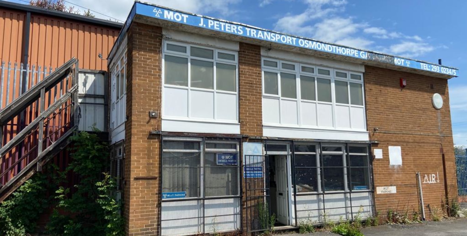 The property comprises a former filling station forecourt with two buildings. The workshop unit is constructed around a concrete frame and has a pitched cement sheet roof, brick/block walls, concrete floor with an inspection pit and rolling road. The...