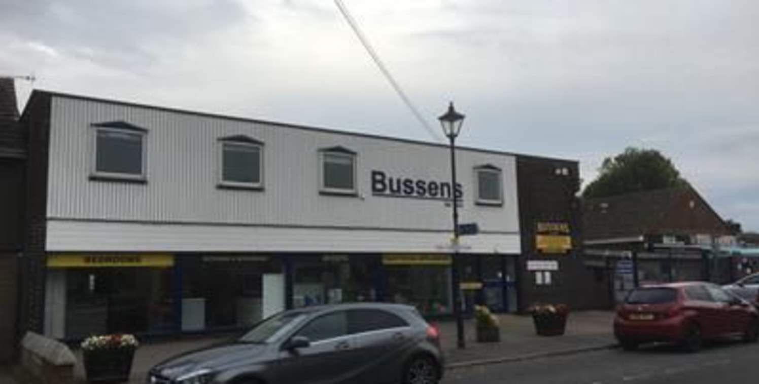 Large town centre department store style investment situated in a two-storey property with first floor ancillary and retail accommodation with a builders merchants and yard to the rear housed in single-storey buildings with a yard area and car ......