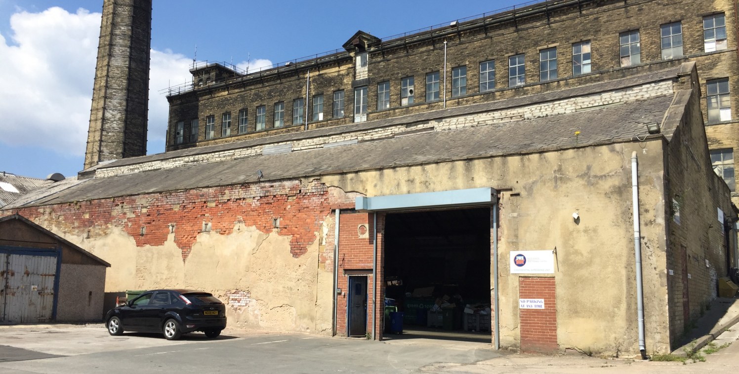 The property briefly comprises modern steel framed and brick clad single storey industrial warehouse/production space that benefits from:

Drive-in access via a full height roller shutter doors;

Solid concrete floor; 

Large concrete surfaced shared...