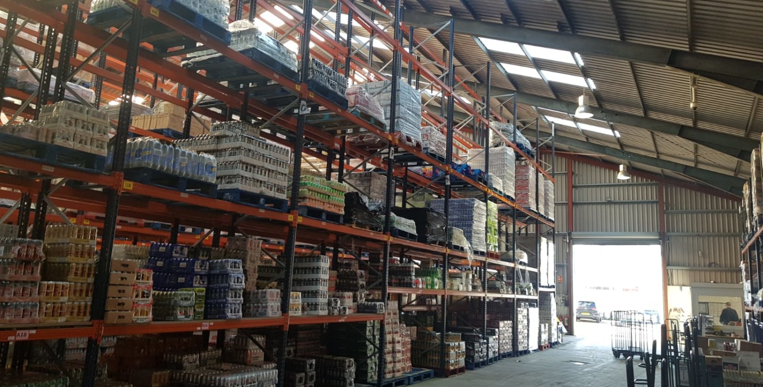 Substantial warehouse with secure yard and excellent eaves

TO LET (11,478 sq ft)