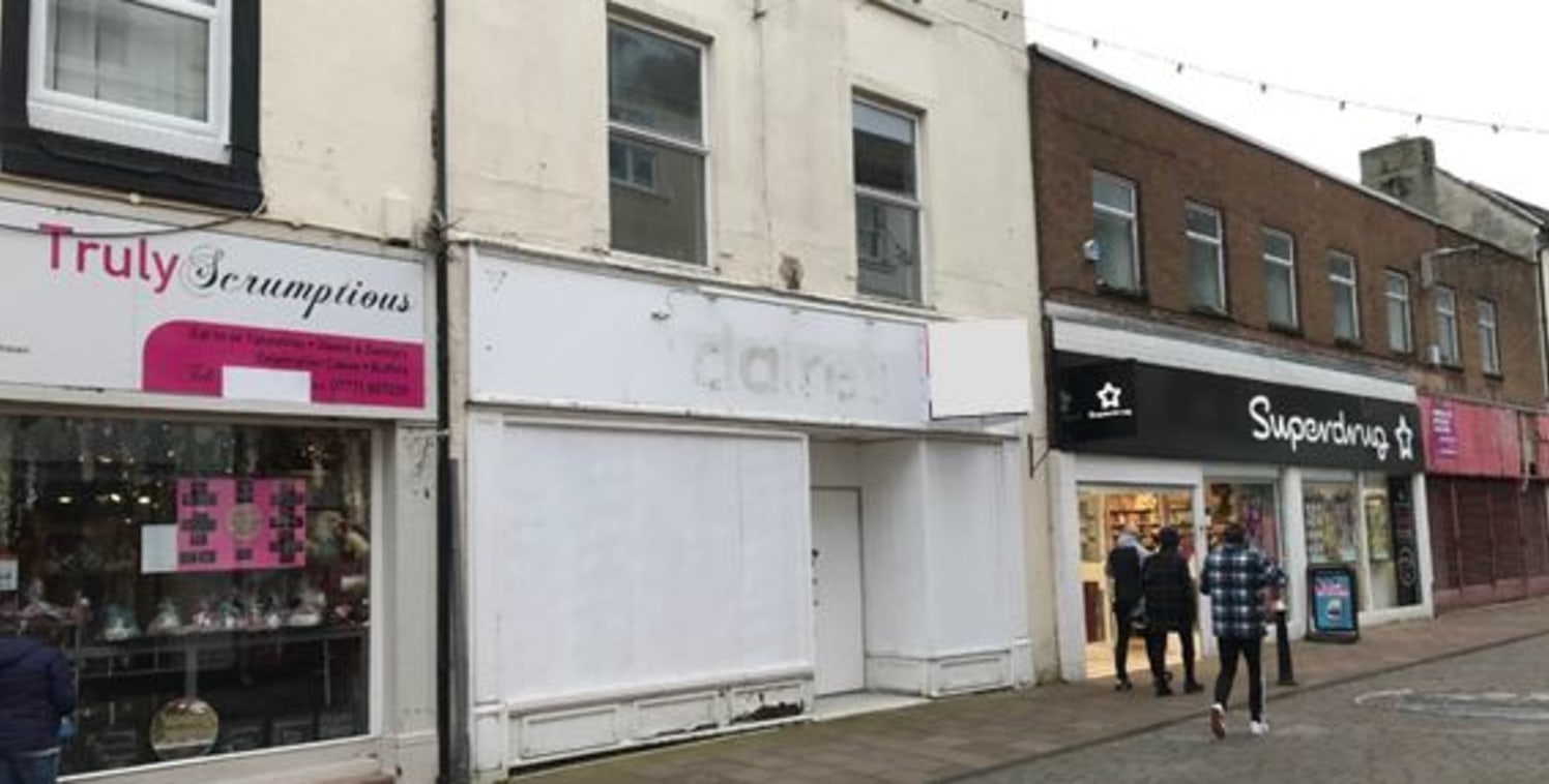 The property comprises three storey, mid terrace prime retail unit providing sales accommodation at ground floor level along with a staff room and WC/kitchen. The property benefits from an extensive glazed frontage incorporating DDA accessibility. In...