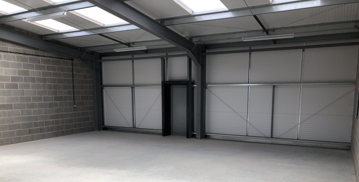 The unit comprises part of a terrace of recently constructed high quality units. There are manual operated roller shutter doors to the front of the unit, along with allocated parking....