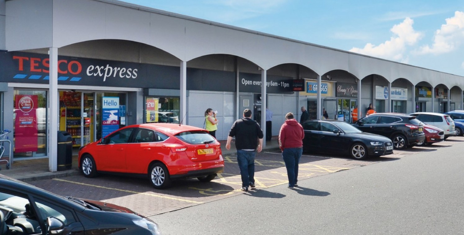 <p>The development is situated at the heart of Carfin and benefits from a prominent roadside frontage along the A723, which is the main arterial route linking Carfin with Motherwell. Existing occupiers include Tesco, Farmfoods, Greggs, Indigo Sun, Ba...