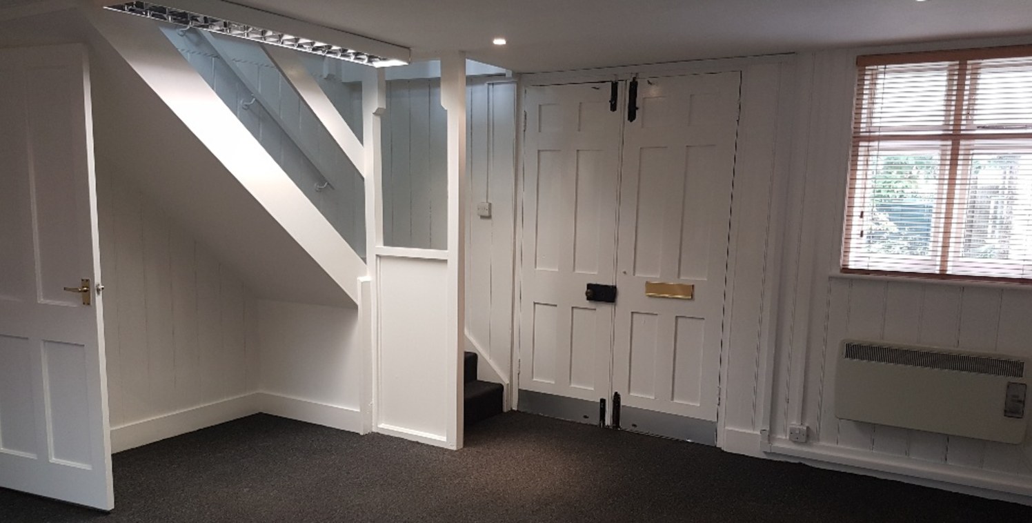 A self-contained period office / studio building arranged over ground and mezzanine levels.\n\nThe ground floor comprises two separate areas plus a small kitchen and WC, while the mezzanine is open plan with roof lights.\n\nThere is ample on-site par...