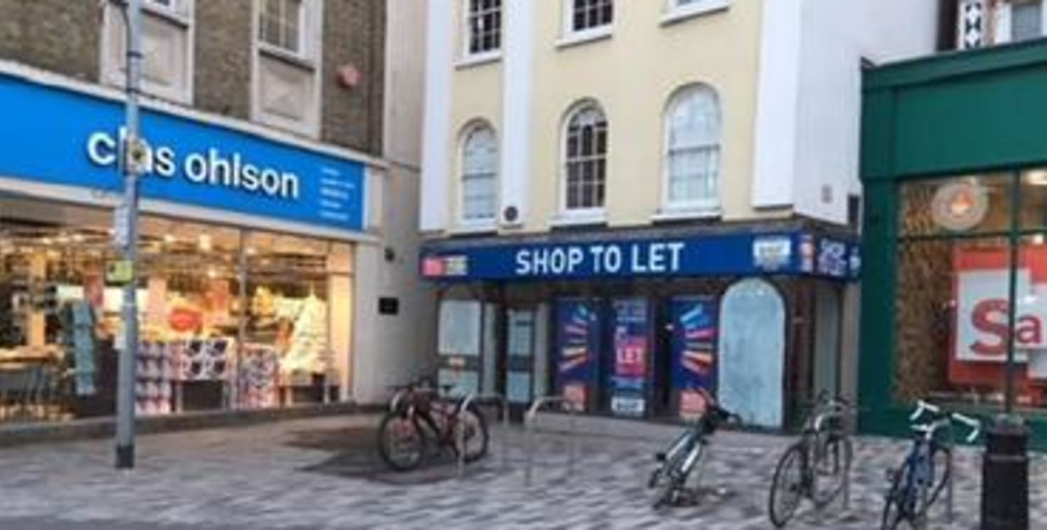 A period Grade II listed building comprising open plan shop unit arranged over ground and basement floors.\n\nLocation: The premises are situated in a very prominent location within the historic Market Place. Nearby occupiers include Chas Ohlson, Ult...