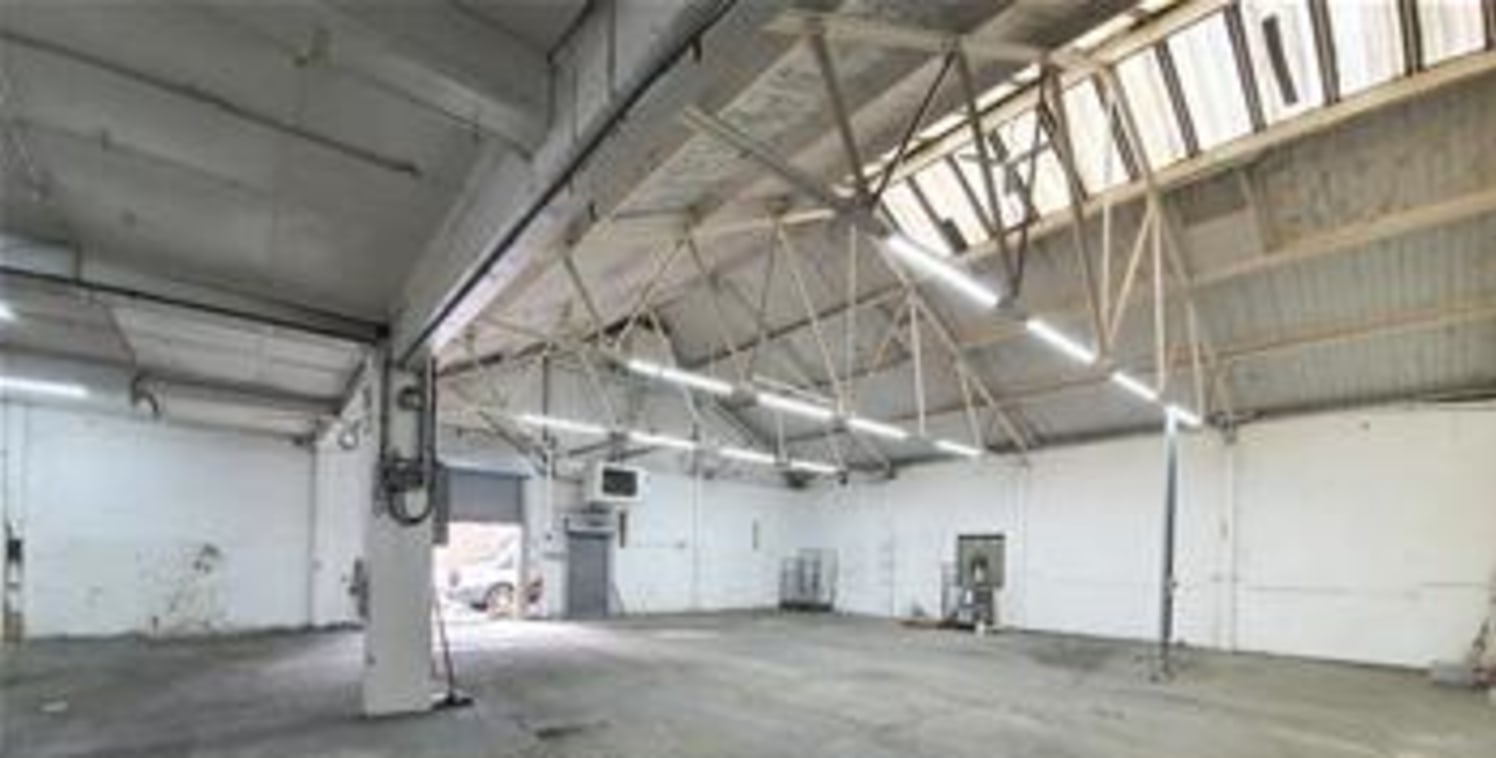 A industrial/warehouse unit configured over the ground floor of steel truss construction to a pitched roof with dual loading points via a roller shutter loading door. A small mezzanine floor has been added for extra storage and welfare....