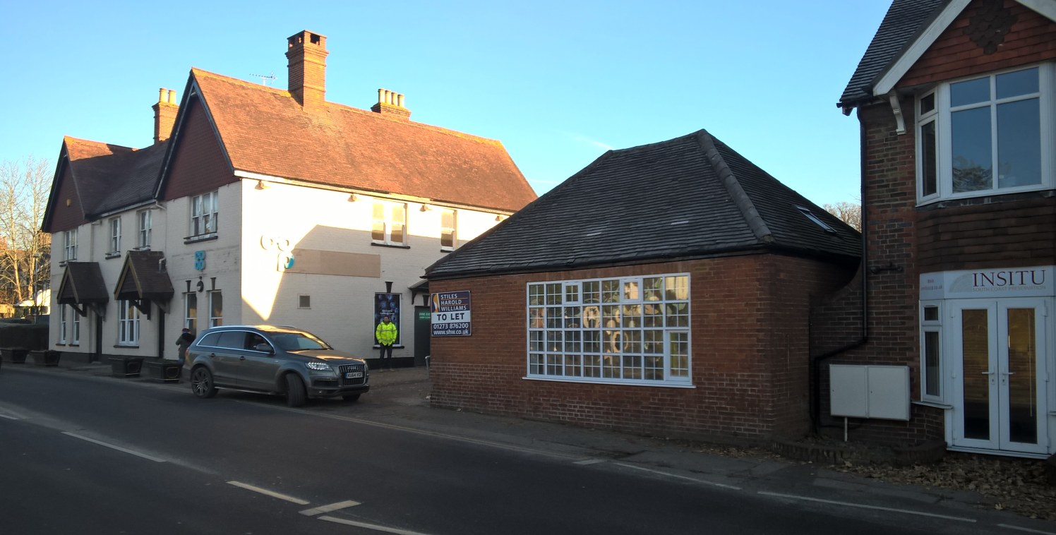 * Retail unit with some outside display/seating depending on use. 

* Glazed shop front 

* Adjacent to the Co Op