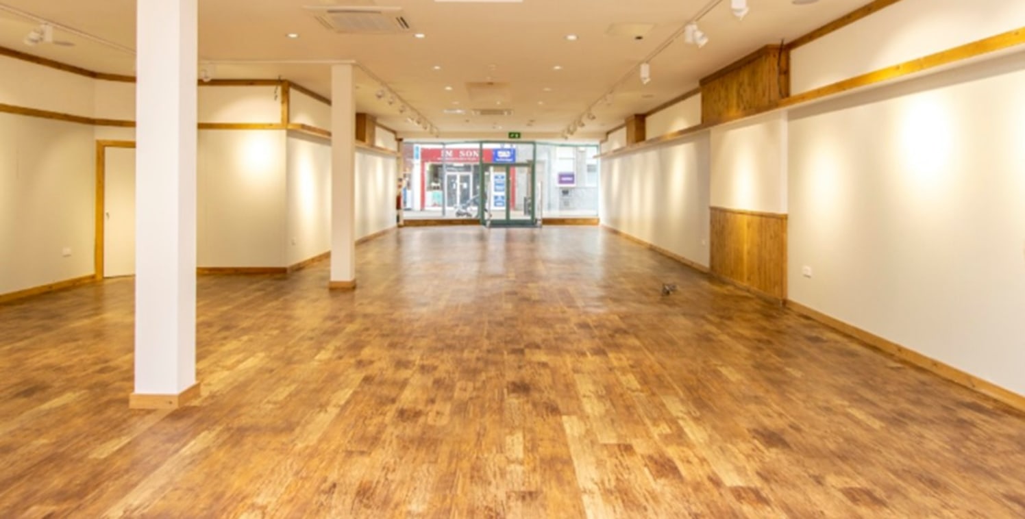 Arranged as a ground floor lockup shop, the premises are presented in excellent order and ready for immediate occupation. Currently set out as an extensive sales area with rear storage, kitchen and staff facilities.

It is understood that substantial...