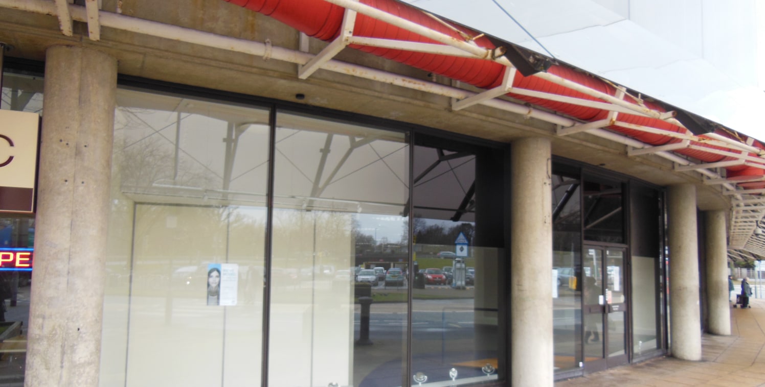 A ground floor retail/office unit with full height glazed frontage and glazed canopy and a separate rear exit into the Kingsmead Shopping Centre.<br><br>The existing fit out includes: partially glazed partitioning along the left flank incorporating t...