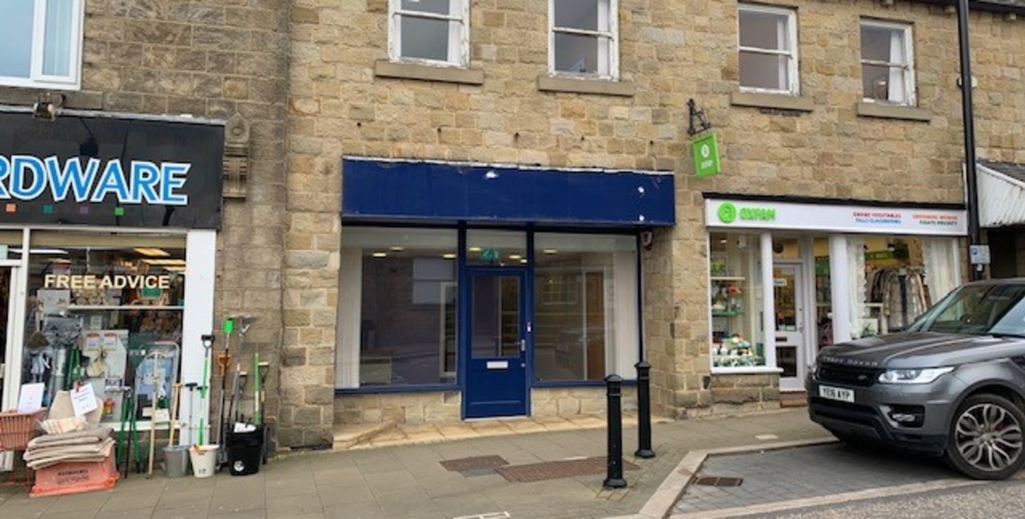 The unit comprises a small ground floor shop that forms part of a parade of stone built retail properties set under a pitched slate roof with separate office accommodation on the upper floor. Internally the unit is currently arranged to provide 3 sma...