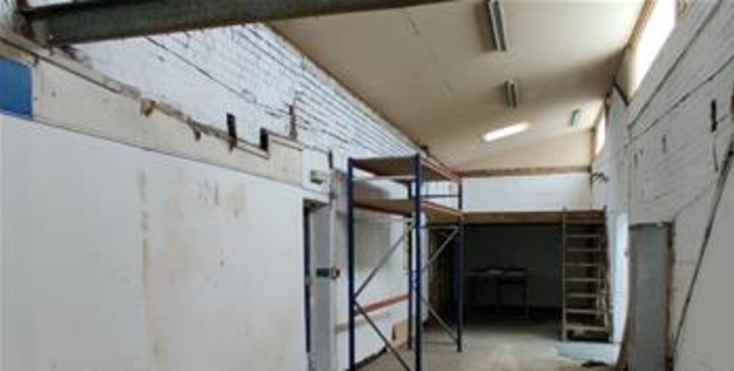 The premises comprise a steel truss frame industrial/warehouse unit of traditional brickwork elevations to a dual bay pitched roof. Access is provided via three electric shutter loading doors and a dedicated loading bay. Ancillary office accommodatio...