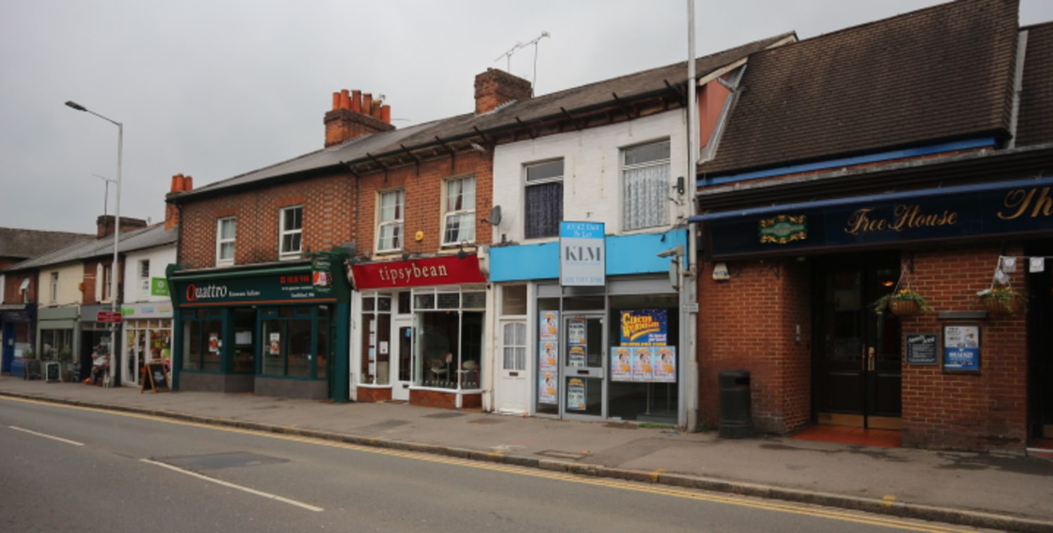 The premises comprise the entire ground floor of a two storey, mid-terrace building of traditional brick construction under a pitched roof.