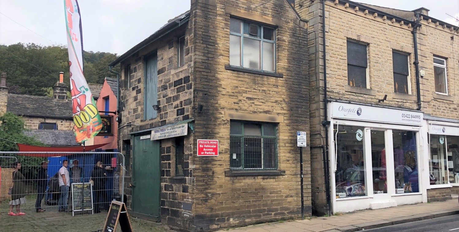 The premises briefly comprises a two story property of stone construction that fronts onto Crown Street in Hebden Bridge Town Centre. This is accessed via a sliding wooden loading door which measures 1.8m wide by 2.48m high and benefits internally fr...