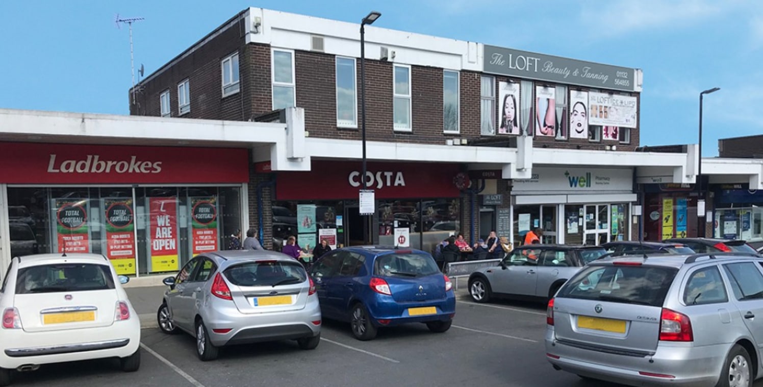 <p class="p1">The scheme is anchored by a Tesco supermarket alongside a number of multiple retailers including the likes of Boots, William Hill, Poundstretcher, Card Factory, The Post Office, Greggs, Farmfoods, Halifax Building Society and Pizza Hut....