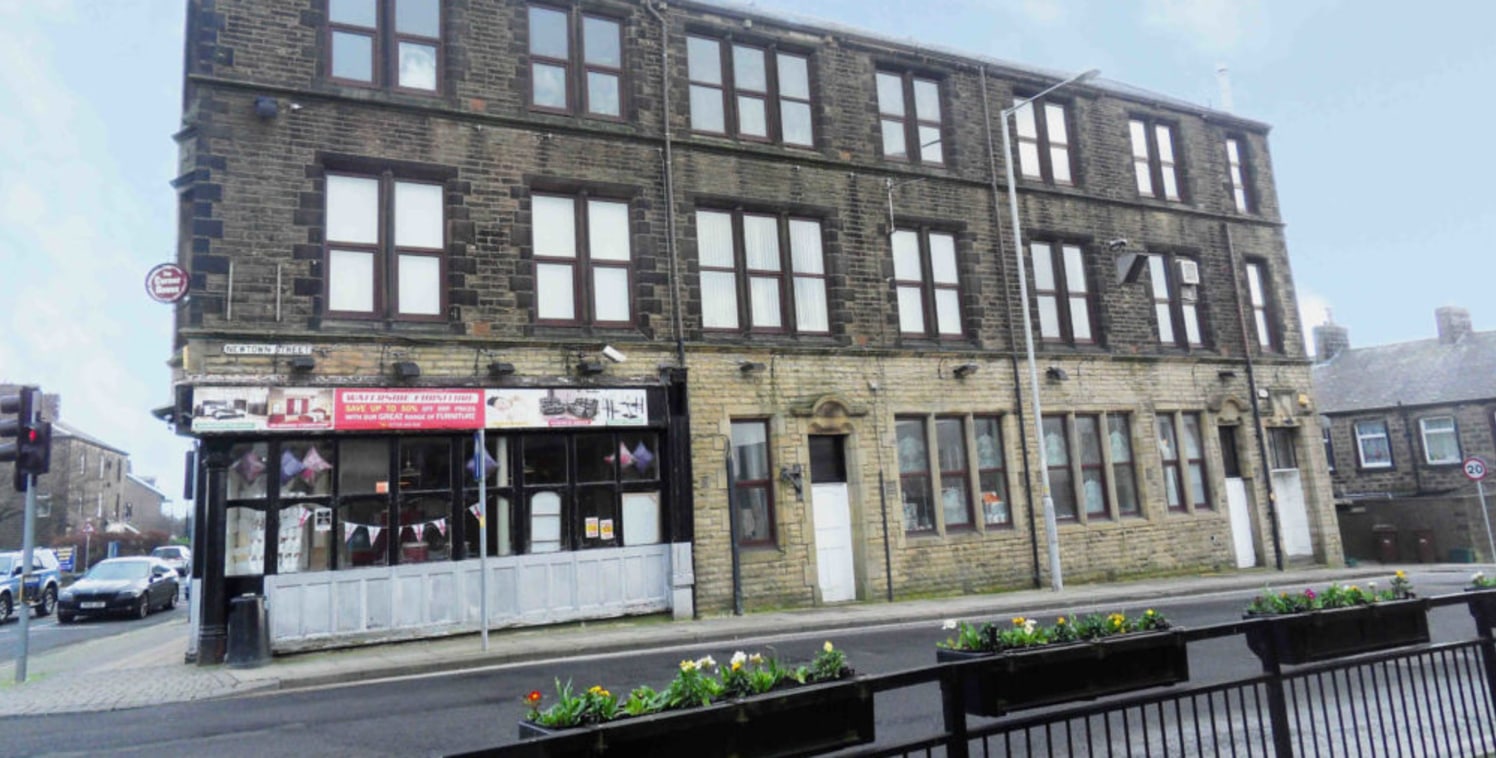 LOCATION\n\nThe property occupies a prominent main road position on the corner of Keighley Road and Newtown Street in an established retail location on the outskirts of Colne town centre. Other occupants in the immediate vicinity include Job Centre P...