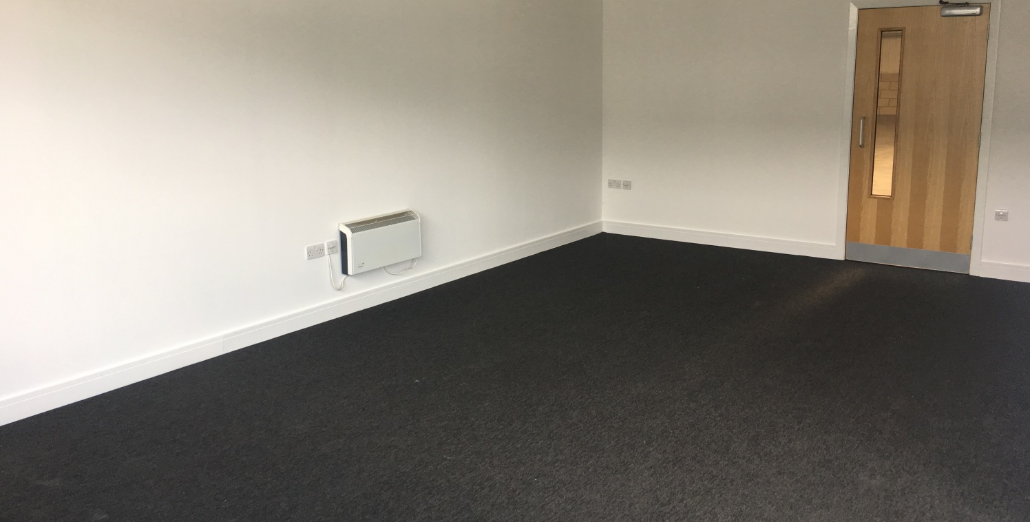 Large reception areas featuring male and female WC's and separate open plan office accommodation. Minimum eaves height of 5.3 m. 1 level access, full height loading door. hanging florescent box lighting. Concrete floor throughout. Gas fired heating....