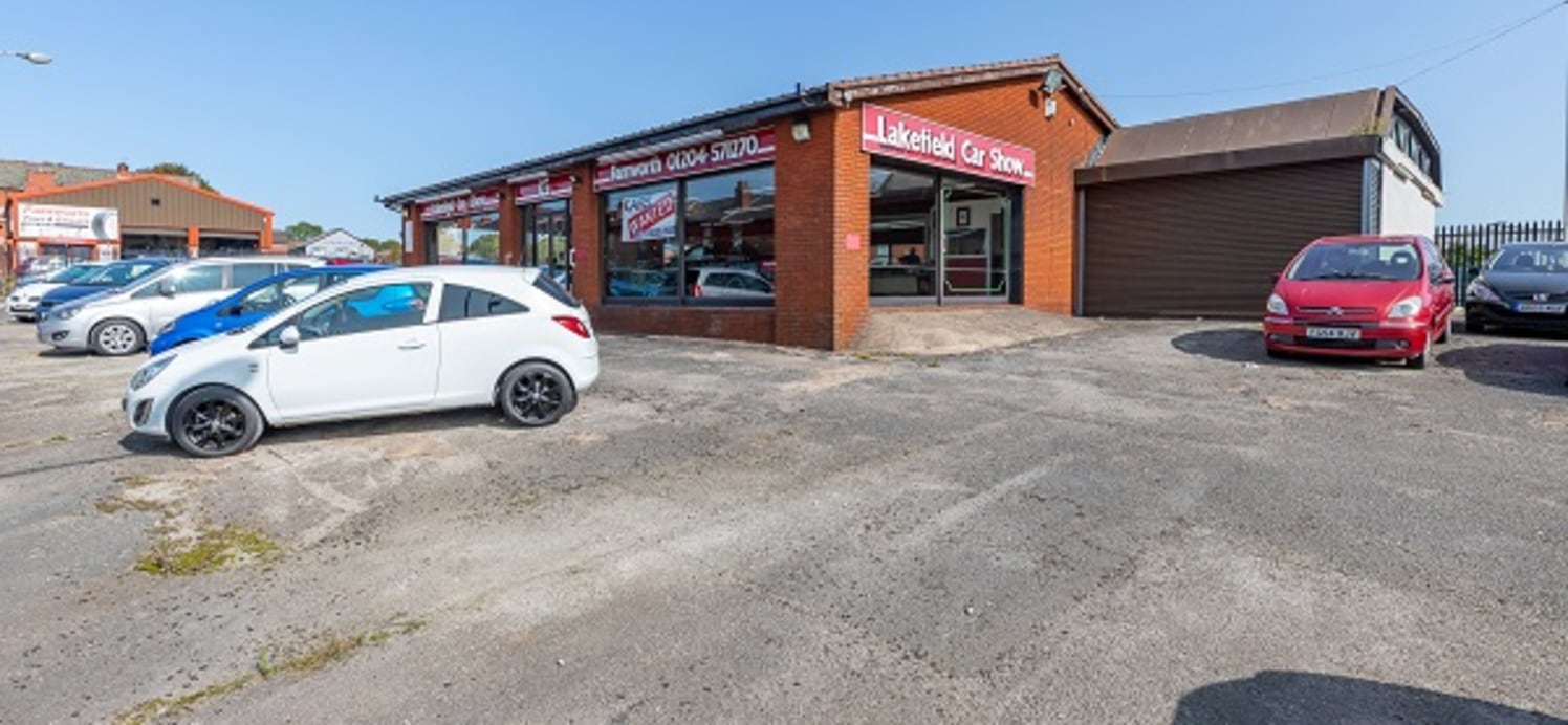 The subject property provides for a single storey showroom / workshop unit, on a self-contained site.

The showroom element of the subject property is of traditional brick construction, with a pitched and tiled roof covering. The workshop element of...