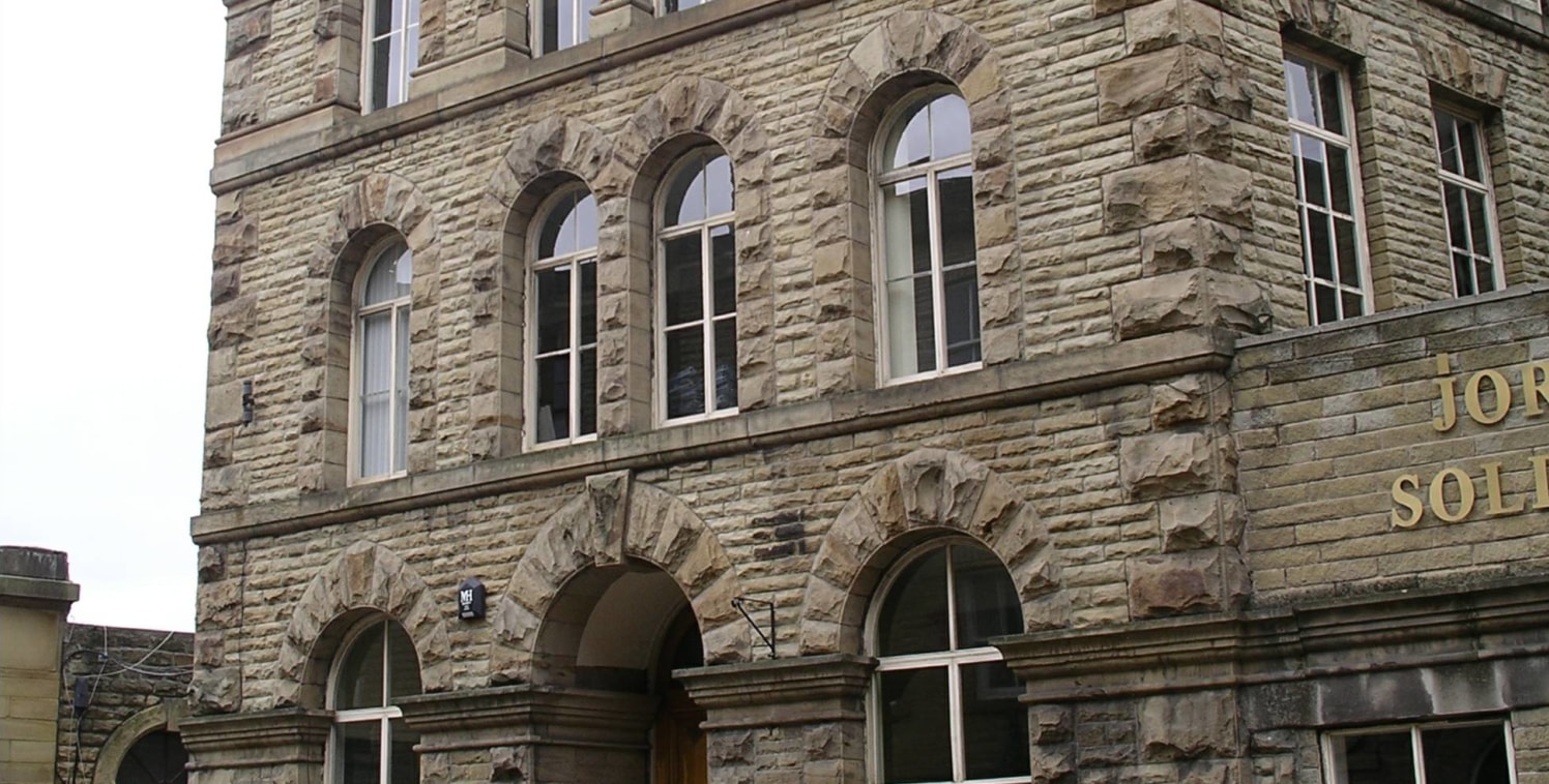 The office property extends to a former Station Masters house, being a two-storey Grade II Listed stone-built building under a pitched and hipped blue slate roof incorporating ornate stone work and the adjacent three storey with basement stone built...