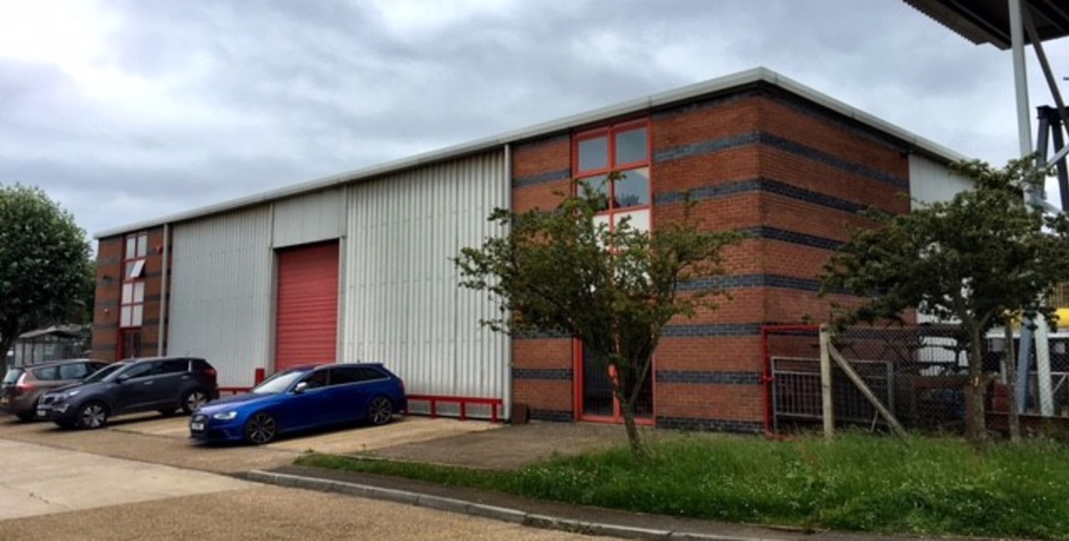 The property comprises a steel portal framed building with part brick and part profile metal clad elevations and pitched profile metal clad roof.

Internally the property is laid out to main workshop space with entrance lobby, three WC's, office and...