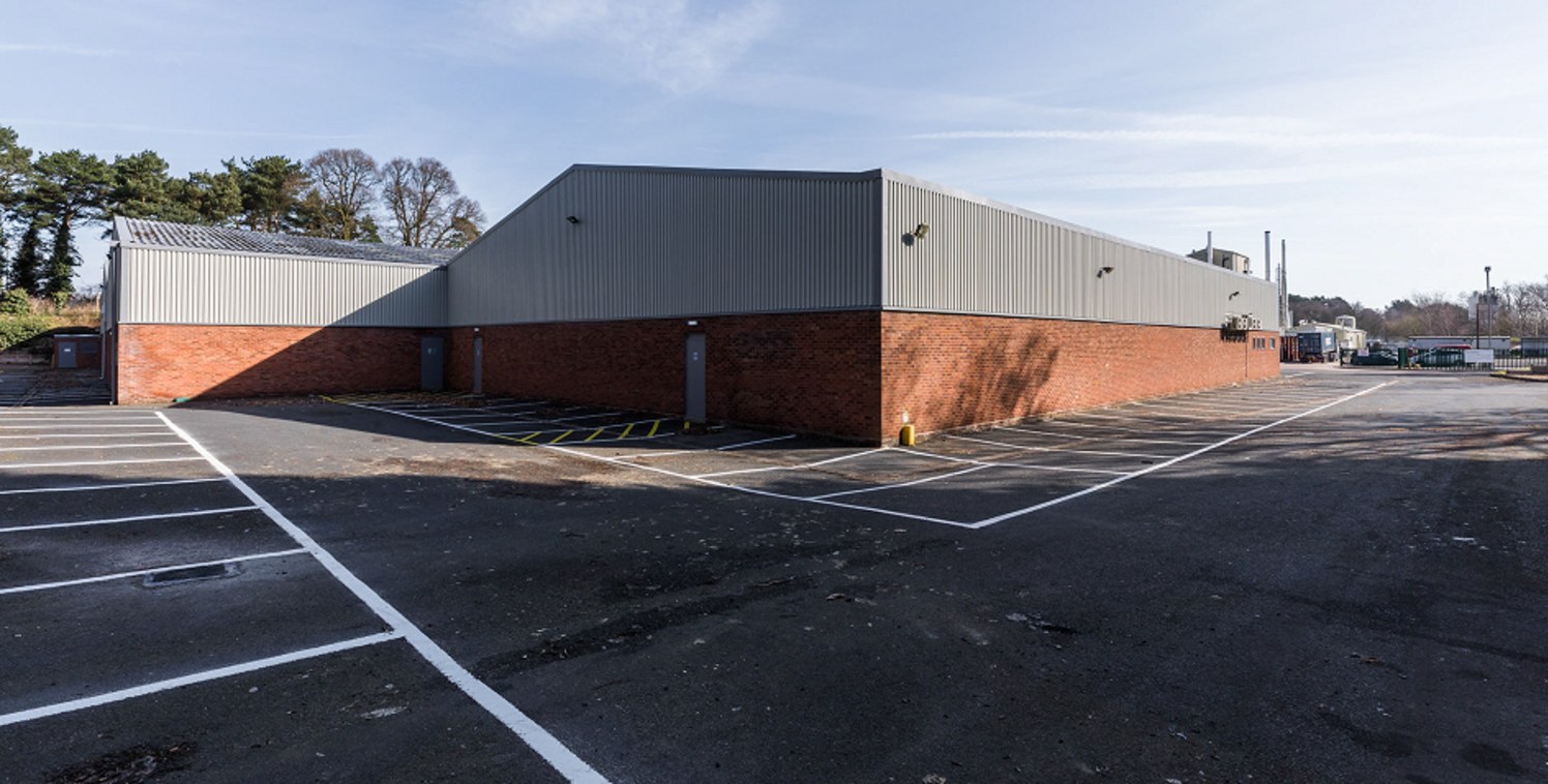 UNIT 2\n\nThe premises provide warehouse of steel portal frame construction with part brickwork / steel clad elevations and profile clad roof incorporating translucent roof lights. The warehouse benefits from 5.4m (17....