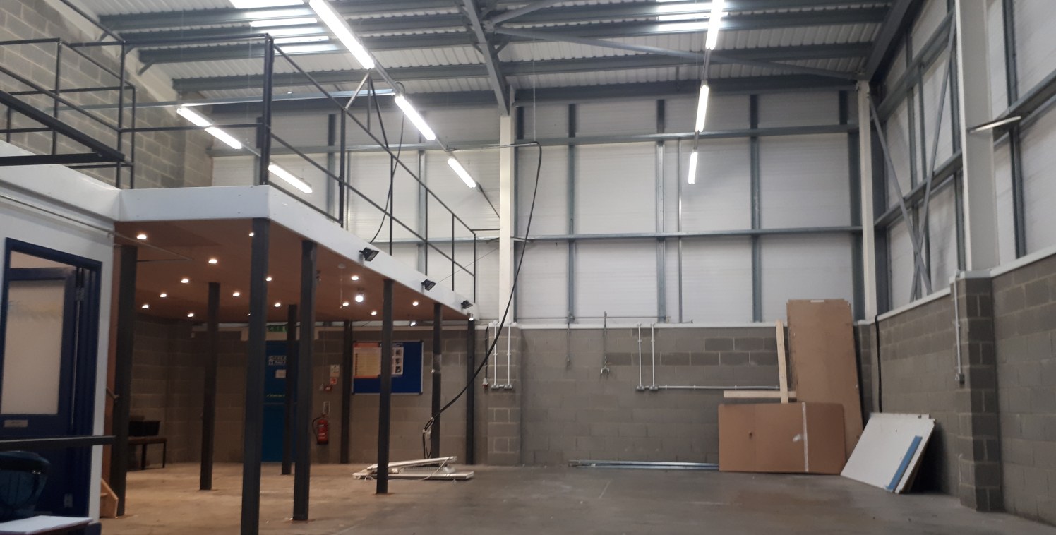 The property comprises a steel portal framed industrial unit being clad in profile metal sheeting under a pitched sheet clad roof incorporating translucent roof lights. Internally, the property comprises open plan works space with an eaves height of...
