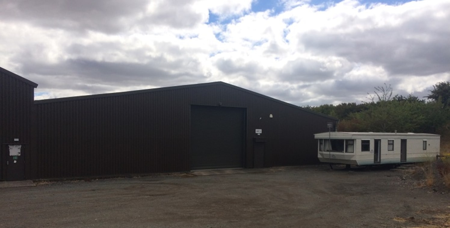 A 10,344 sq ft warehouse ideally suited to storage and distribution users. Two miles from Junction 5 of the M5 motorway.