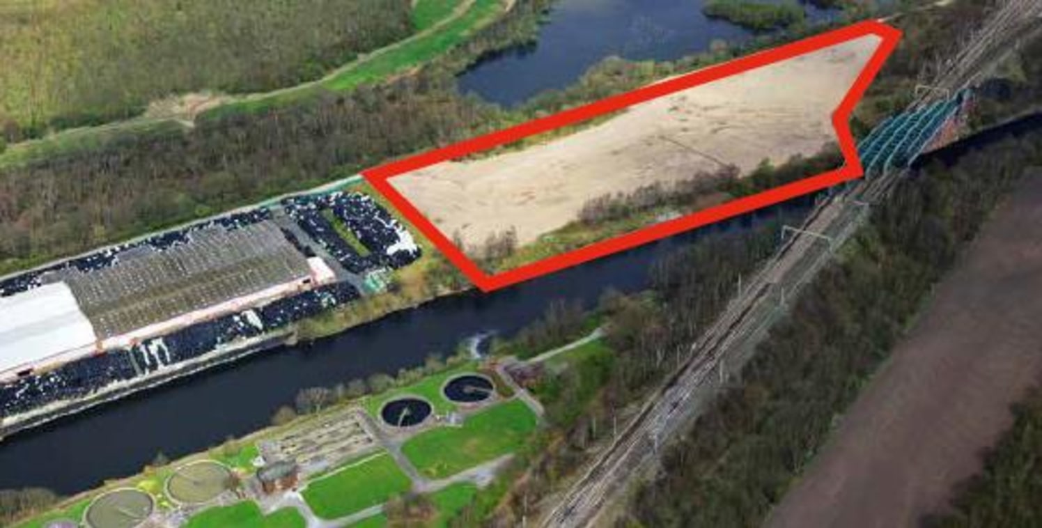 Unsurfaced site adjacent to Port Warrington. Approximately 10.15 acres. Appropriate for a development site, warehousing, processing or open storage.