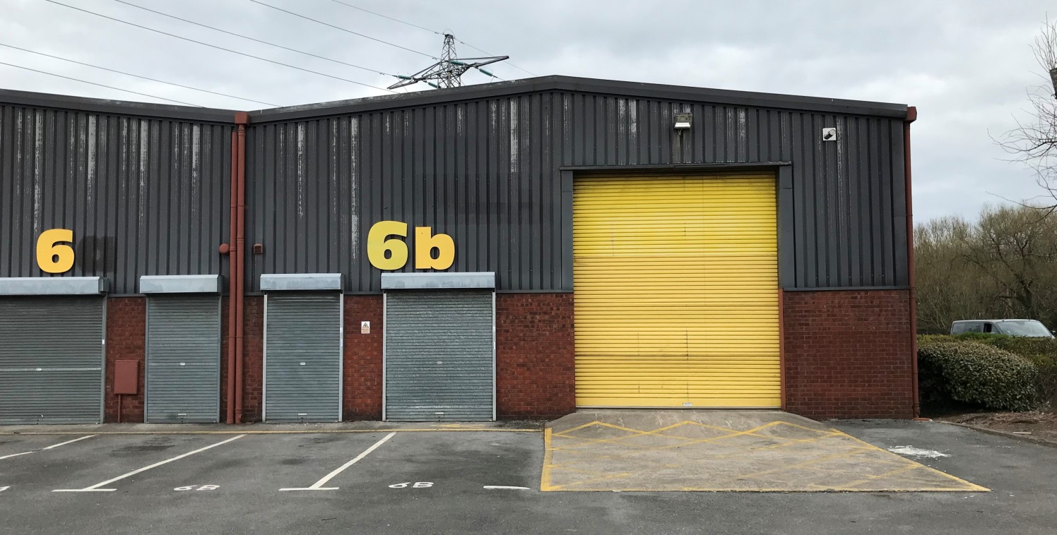 The property comprises a recently refurbished, prominent end of terrace modern industrial / trade counter unit.

The property is of steel portal frame construction, with part brick and part steel profile sheet cladding. There is an insulated pitch ro...