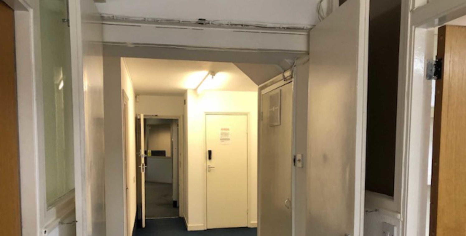 The property sits in a secure gated compound and comprises two storey offices leading to a rear warehouse area which has also been converted to provide further office space. There is parking to the front for approx 4/5 cars. To the rear of the site i...