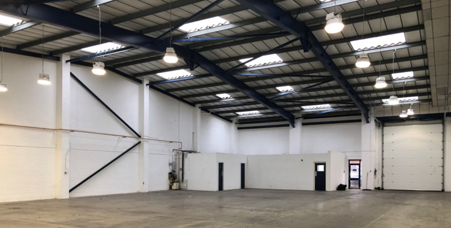 The subject property is a detached industrial unit with two storey ancillary offices. It is constructed on a steel portal frame with a solid concrete floor, blockwork elevations and profile sheet roof incorporating translucent roof lights. The proper...