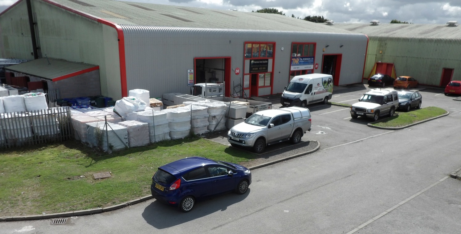 A modern trade counter/industrial unit situated on a well established trading estate on the Isle of Anglesey with occupiers including Wolseley, Eurocell, TN Robinson, CES & Huws Gray

5,338 sq ft with compound

Further compound area up to 1 acre also...