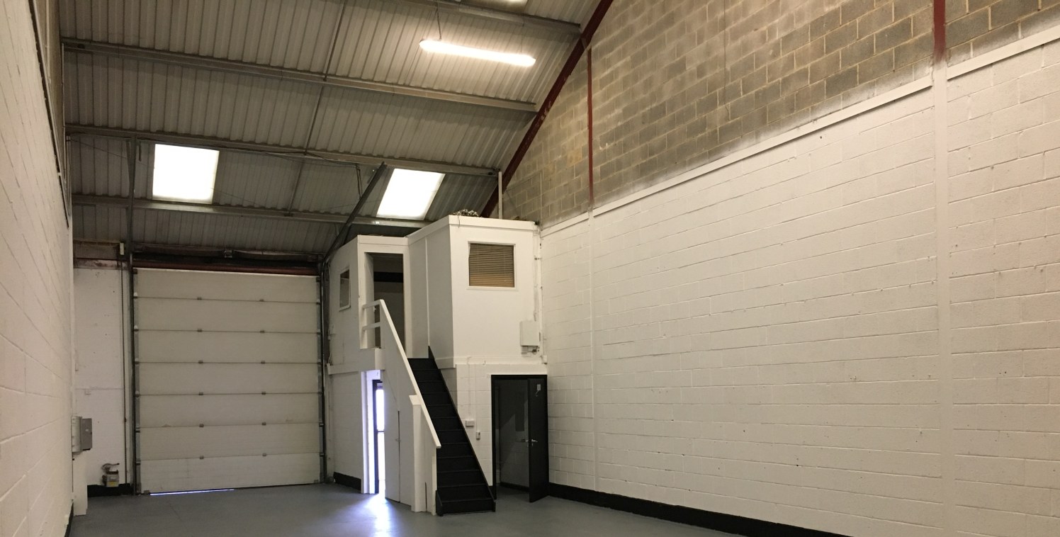 The property comprises part of a modern terrace of industrial units of steel portal frame construction with external cladding of brickwork and profile metal sheet. The premises benefits from: