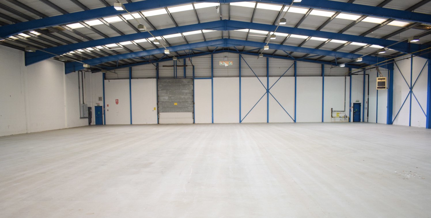 The property comprises a terrace of 9 industrial units of steel portal frame construction with brick / block walls to dado level with insulated clad panels above. The roof is pitched with insulated profiled panels with intermittent roof lights.

Ther...