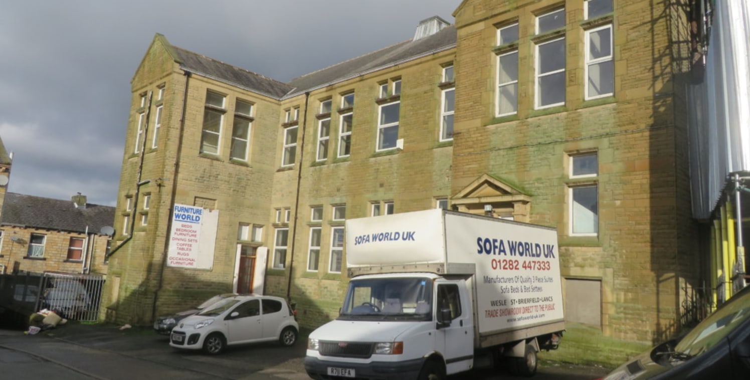 LOCATION\n\nWesley Street is situated just off Burnley Road in Brierfield town centre being situated to the rear of the Zion Church.\n\nDESCRIPTION\n\nA substantial two storey building that has been used for light manufacturing together with a showro...