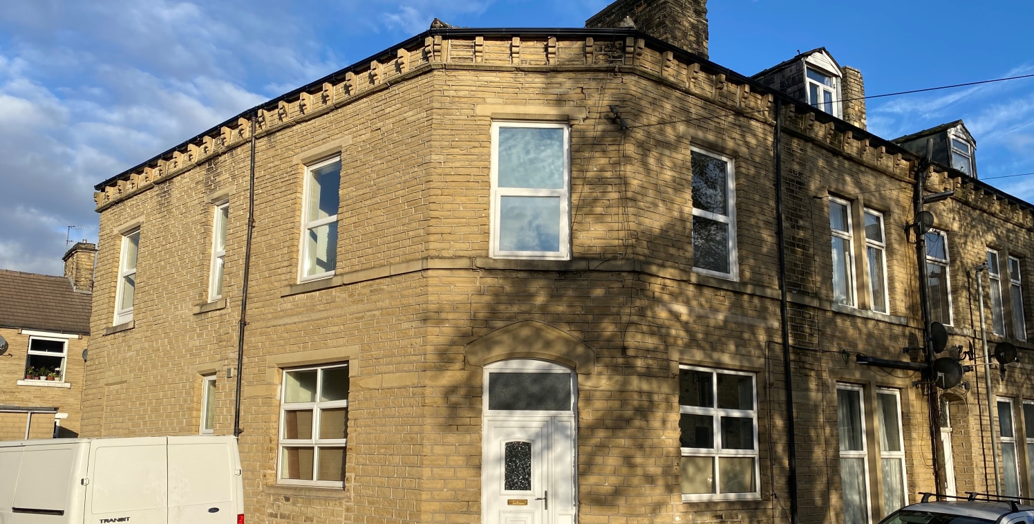 The property is a two storey with attic and basement corner end terrace property under a dual pitched and hipped slate roof. Internally the property has been partitioned to form seven small flats with five benefitting from en-suite shower and toilet...