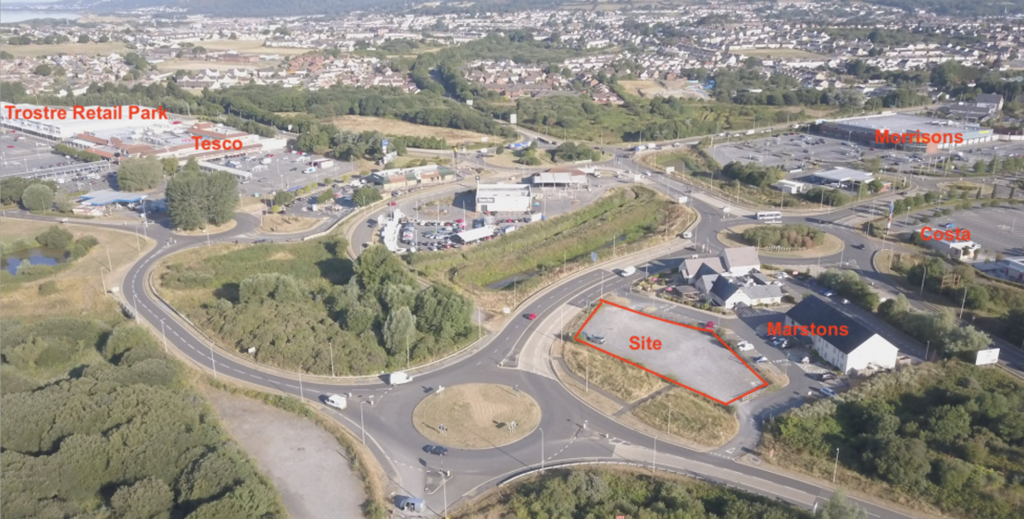 The site is highly visible and located between the two retail parks having a prominent roundabout location just off the A48 Swansea - Llanelli main road and immediately adjoining a Marstons Pub and Hotel outlet (Sessile Oak).\n\nThe Site itself is sh...