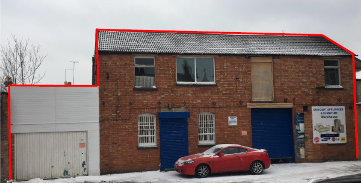 The property comprises a two-storey red brick building, with storage/workshop accommodation on the ground floor and additional open-plan space, principally across two rooms, on the first floor\nThere is a shutter door facing onto the yard area, which...