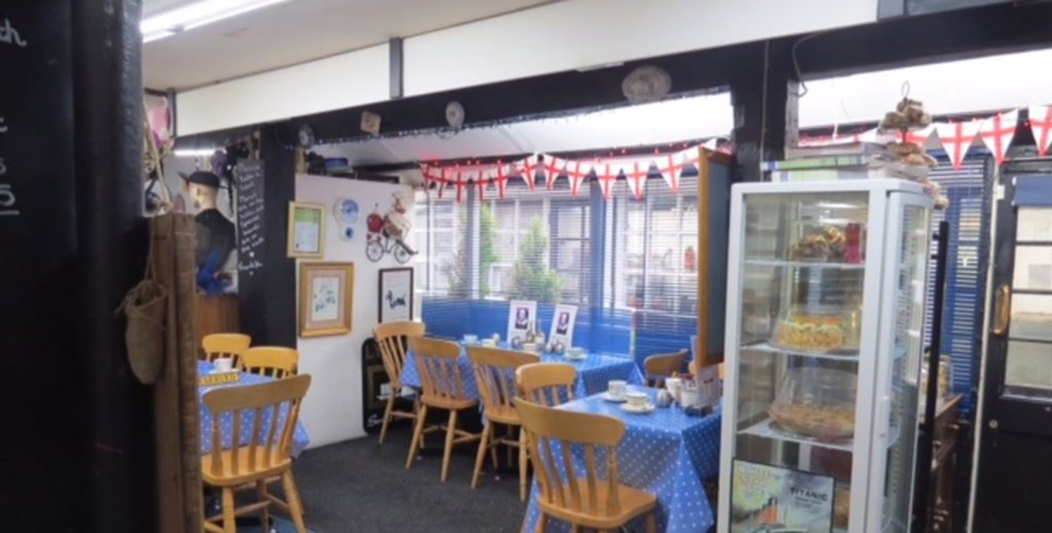 A ground floor caf&eacute; premises with 32 covers. Included in the premises are all fixtures and fittings such as coffee machines, tables, chairs and kitchen equipment. 

The caf&eacute; sits within a complex of antiques centres and boutique retail...