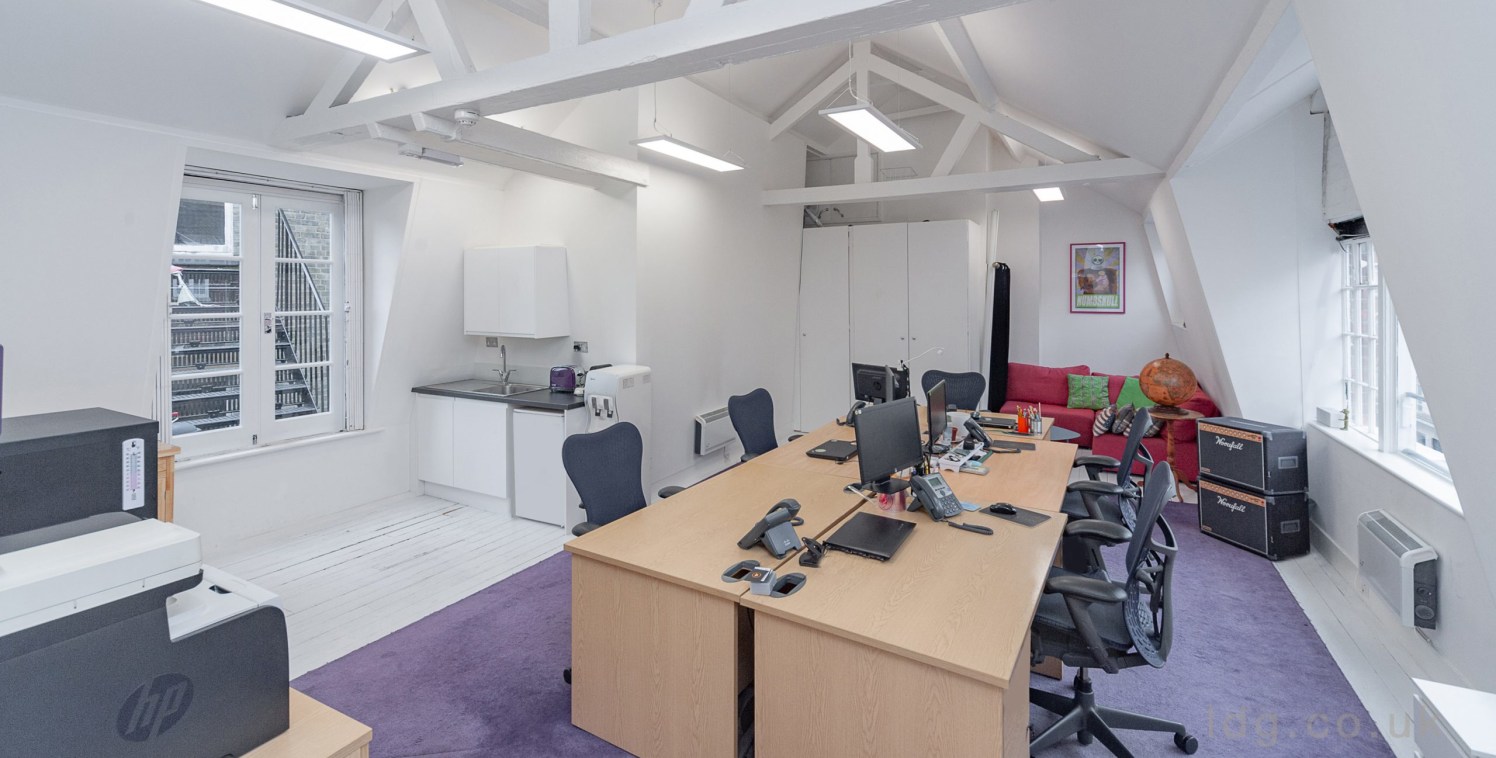 Strapline: Creative and media style workspace - High pitched ceilings with exposed beams - Shared cloakrooms - Excellent natural light - White washed wood...