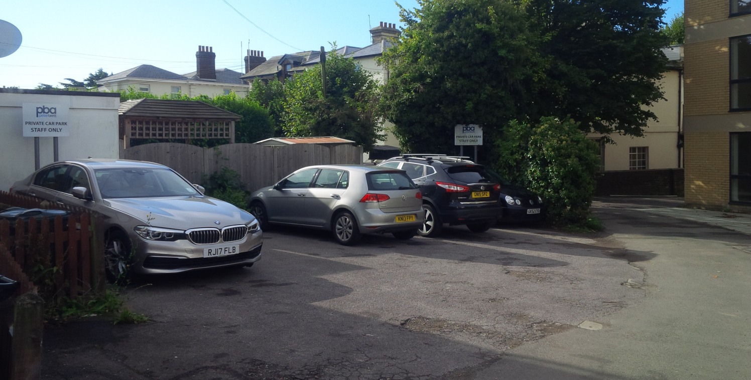 This site of some 0.028 of an acre is laid to tarmac and is capable of taking 5 cars conventionally and 6 if two cars are to be 'blocked in'. It is an established car park in this part of Ashford.