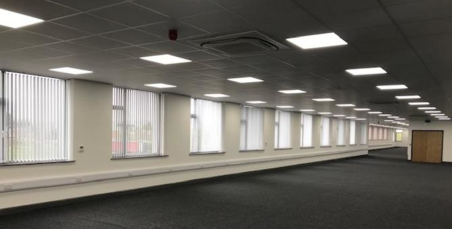 The premises comprise a three storey office building originally constructed for Whitbread Brewery, but more recently occupied by East Lancashire NHS Trust.<br><br>The accommodation is arranged on the second floor, which is serviced from a ground floo...